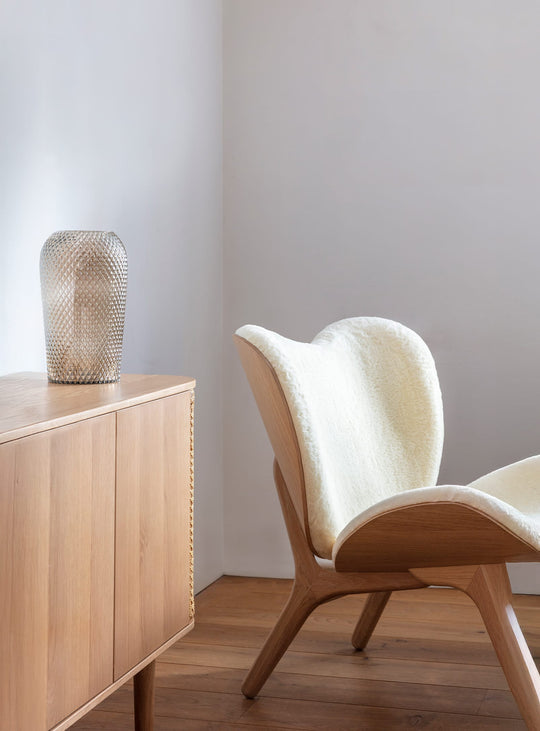 Fauteuil Umage A Conversation Piece low, une pièce forte pour intérieur raffiné.