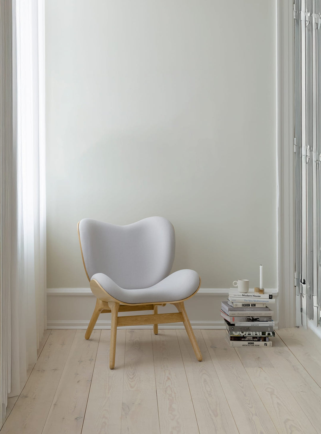 Fauteuil Umage A Conversation Piece low, un fauteuil pensé pour la détente.