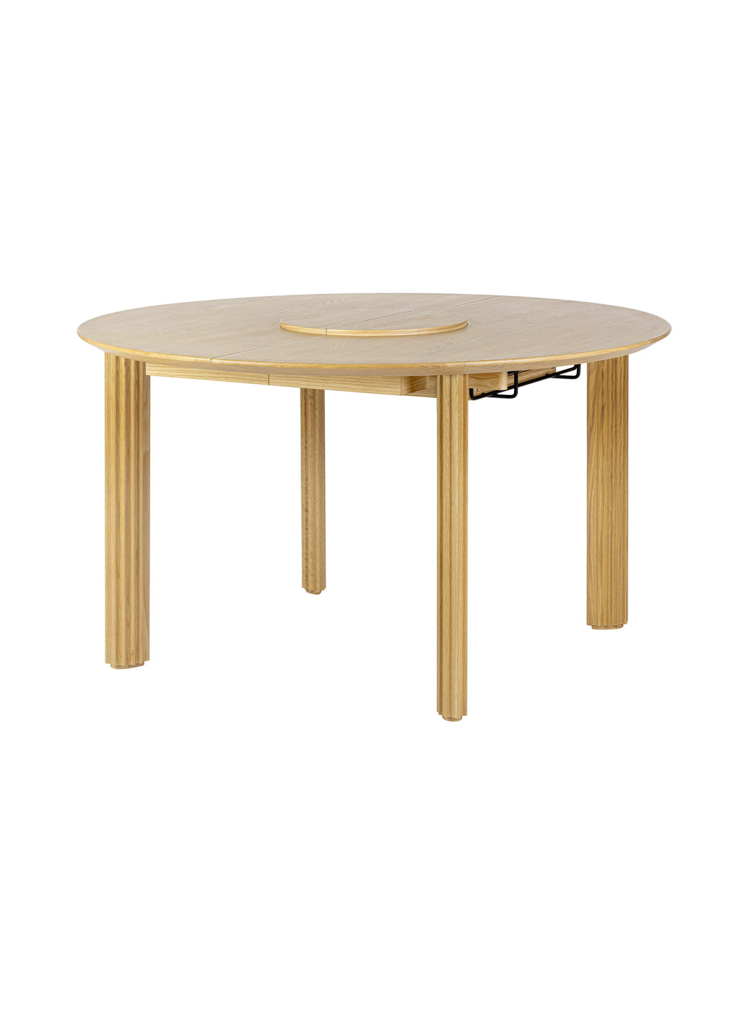 Table à dîner extensible Comfort Circle Umage avec rallonges intégrées discrètement sous le plateau. chene