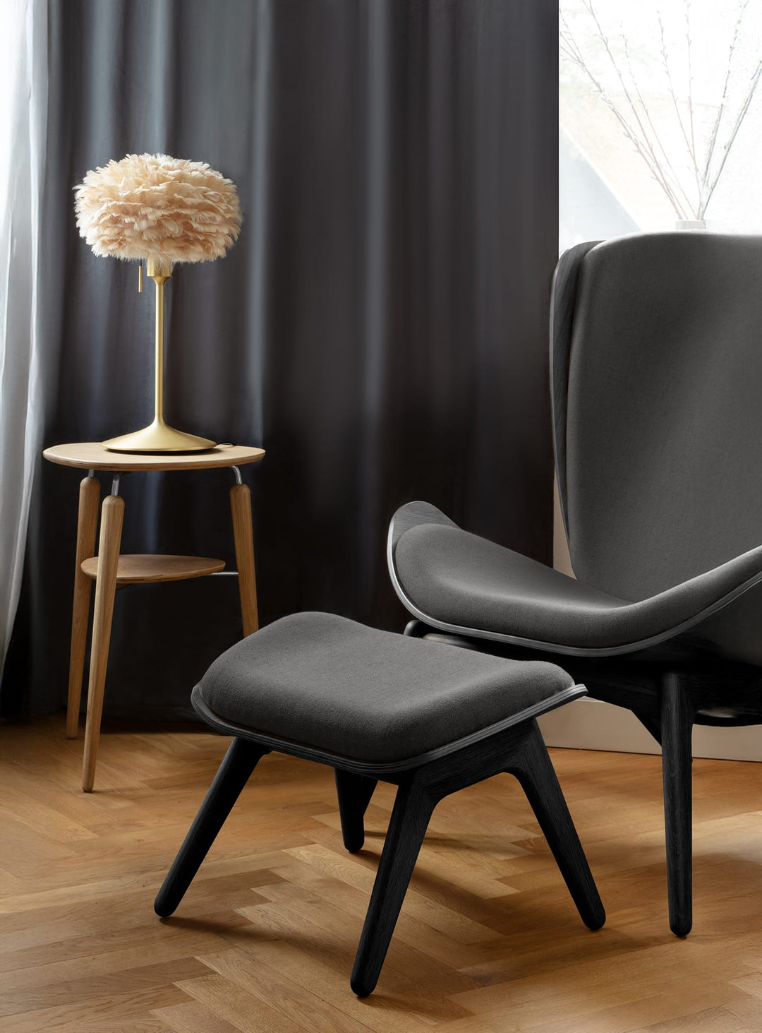 Fauteuil The Reader Umage : une expérience de lecture unique dans un fauteuil cocon. ombre