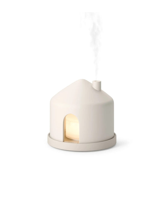 Diffuseur Casita d'Umbra avec réservoir de 150 ml, lumière LED chaleureuse et rangement pour huiles essentielles.