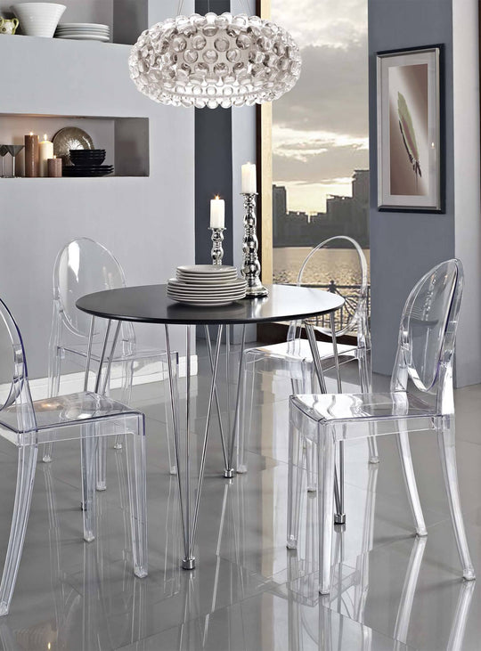 Chaise Victoria Ghost Nüspace : classique revisité et modernité pure. transparent