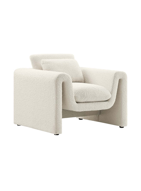 Le fauteuil Waverly séduit par ses lignes courbes et son confort luxueux. ivoire