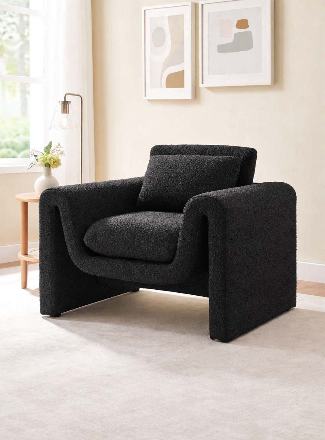 Fauteuil Waverly au design ondulé, élégant et confortable pour un intérieur raffiné. noir