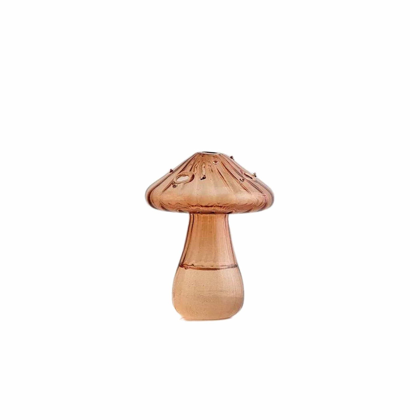 Créez une atmosphère enchantée dans votre maison avec les vases Champignon en verre de Filtrum Home. Leur design unique en forme de champignon apporte une touche de magie à votre décoration.