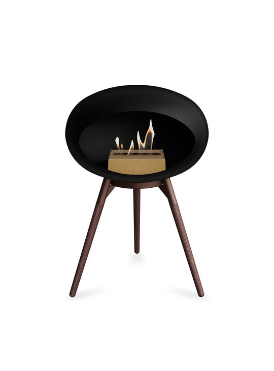 Foyer design Ground Low Dome noir Le Feu : chaleur douce et ton profond.