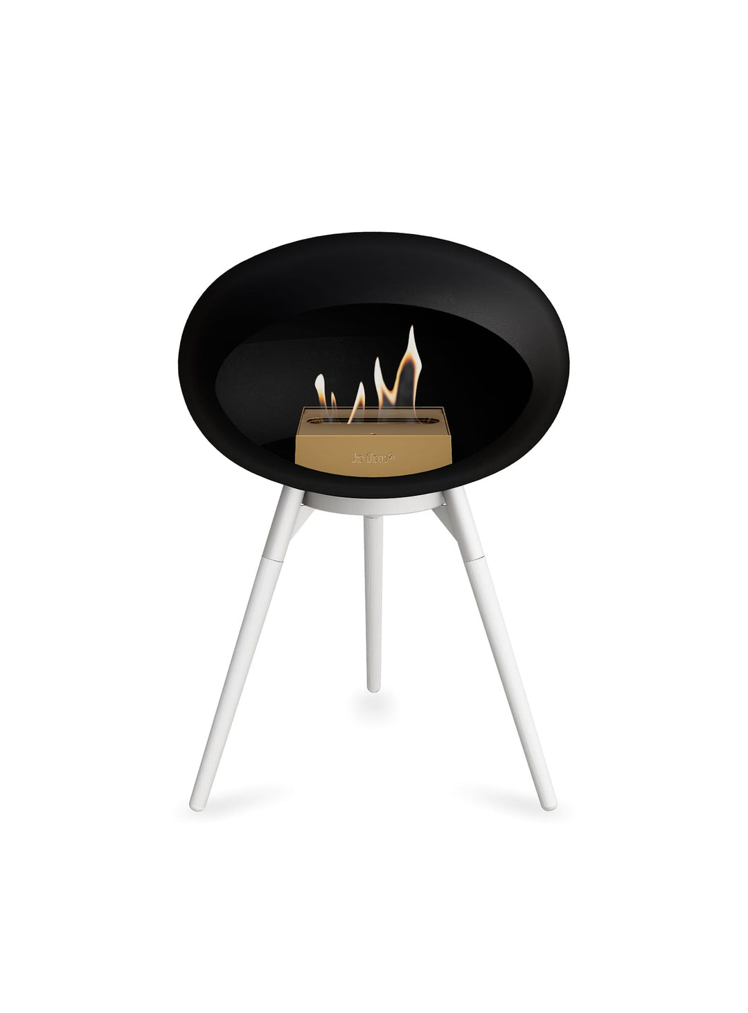 Foyer Le Feu Ground Low Dome noir : design nordique et chaleur naturelle.