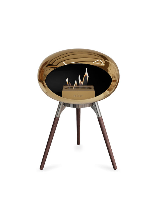 Foyer design Ground Low Dome Le Feu : feu pur et reflets dorés.