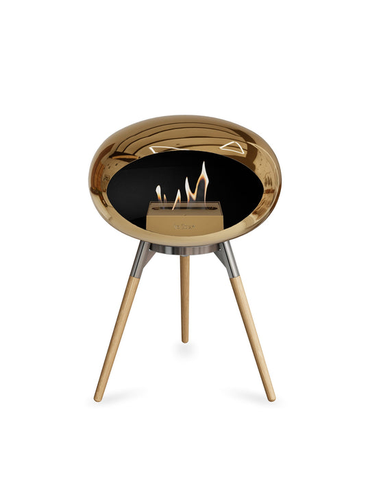 Foyer Le Feu Ground Low Dome or rose : chaleur naturelle et ton lumineux.