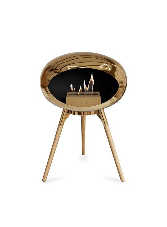 Foyer design Ground Low Dome de Le Feu : or rose et feu chaleureux.