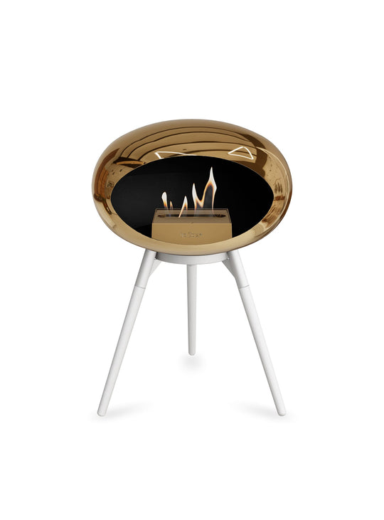 Foyer Ground Low Dome Le Feu or rose : design compact et flamme dorée.