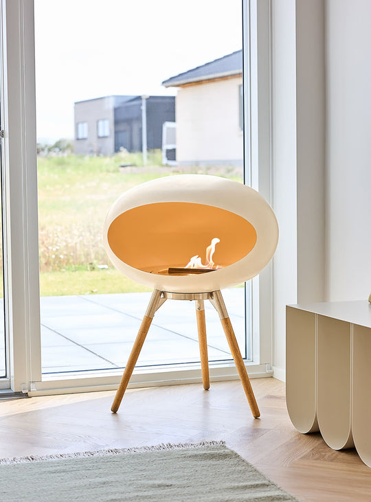 Sublimez vos soirées avec le Ground Low Dome blanc de Le Feu, feu design et chaleureux.