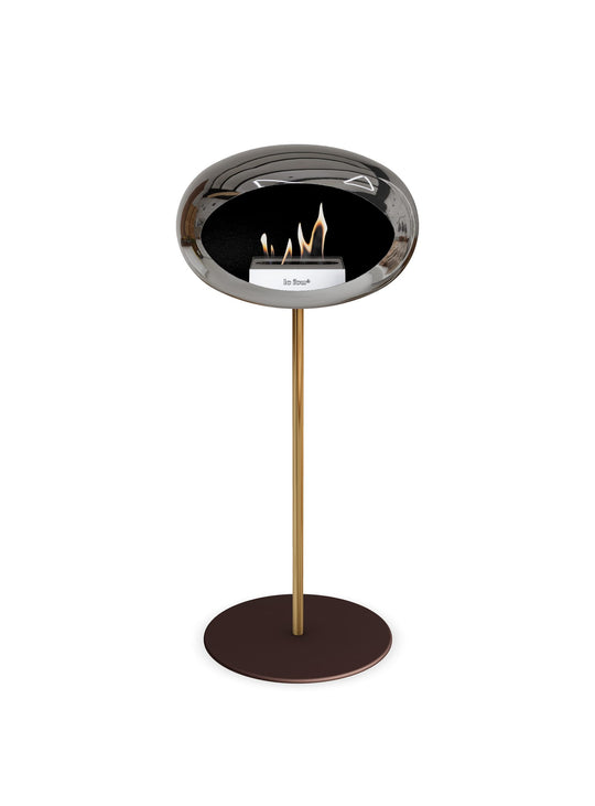 Foyer design High Dome de Le Feu : argent chromé et feu chaleureux.