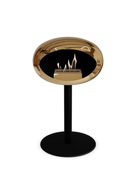 Low Dome en or rose de Le Feu : cheminée autoportante design et raffinée.