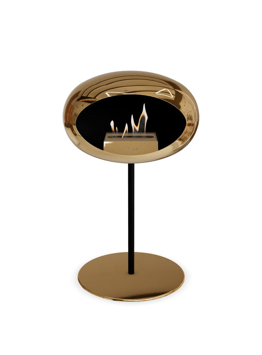 Cheminée autoportante Low Dome en or rose de Le Feu : pièce design.