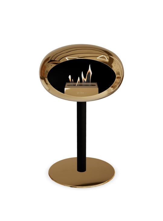 Le Feu Low Dome en or rose : cheminée autoportante chaleur enveloppante.