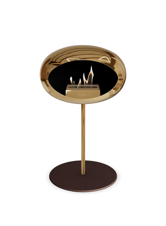 Le Feu Low Dome en or rose : cheminée autoportante chaleur authentique.