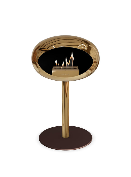 Low Dome en or rose de Le Feu : cheminée autoportante flamme élégante.