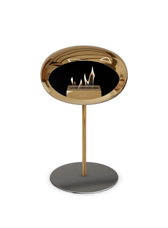 Low Dome en or rose de Le Feu : cheminée autoportante chaleur propre.