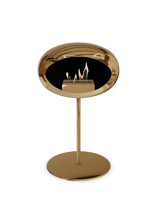 Cheminée autoportante Low Dome en or rose de Le Feu : flamme raffinée.