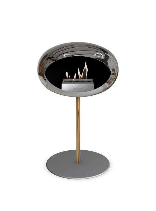 Foyer Le Feu Low Dome argent : chaleur naturelle et style lumineux.