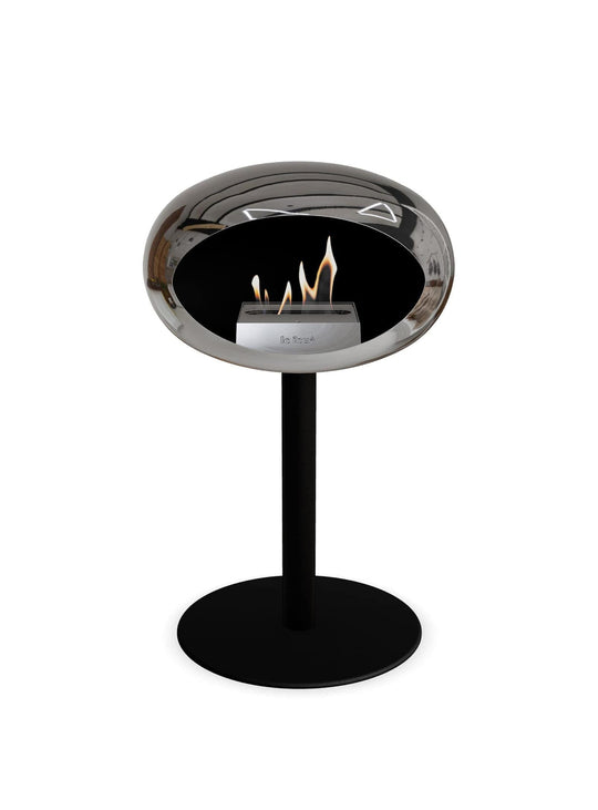 Foyer Le Feu Low Dome argent : design nordique et chaleur naturelle.