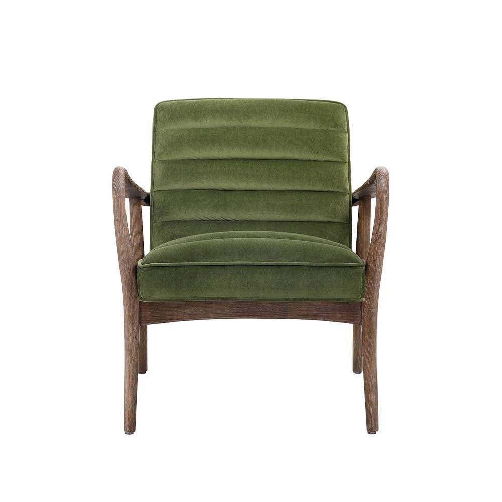 Le fauteuil Anderson : une combinaison parfaite de confort et d'esthétique. Le velours et le bois de frêne créent une atmosphère accueillante et raffinée.