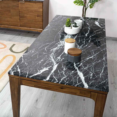 Laissez-vous séduire par notre table en bois Allure, sublimée par un somptueux plateau en marbre. Un équilibre parfait entre beauté et durabilité pour votre espace de vie.