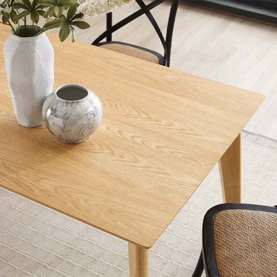 Table à dîner Oracle : simplicité et fonctionnalité. Design Mid-century Modern, pieds en bois effilés. Parfaite pour la salle à manger, elle accueille jusqu'à 8 personnes avec style.