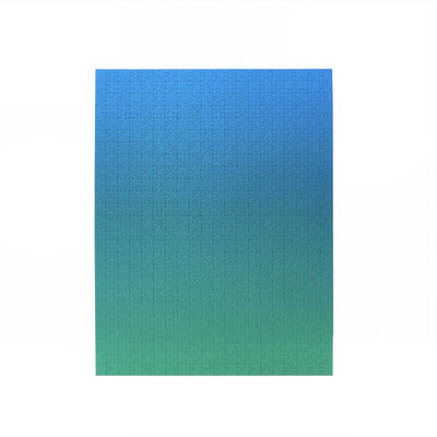 Explorez la subtilité des couleurs avec le casse-tête en dégradé de Bryce Wilner. Une manière de se concentrer et de s'immerger dans un défi coloré unique. bleu / vert