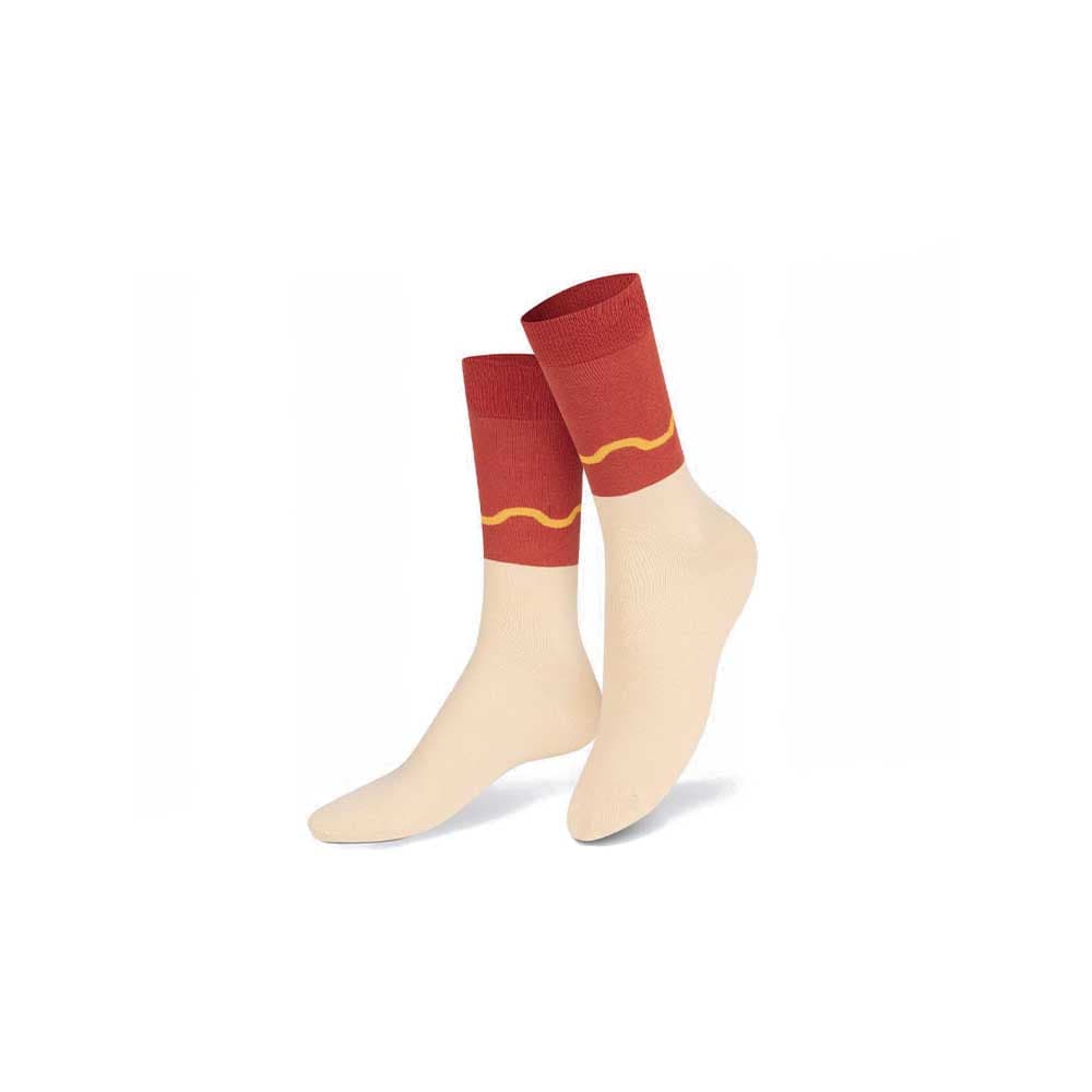 Découvrez l'originalité d'Eat My Socks avec des bas en forme de hot dog. Un clin d'œil à la gourmandise, une expérience de mode amusante pour votre garde-robe.