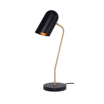 Lampe de table Caden : contraste visuel saisissant entre acier noirci et laiton poli. Design fluide et élégant pour une ambiance sophistiquée.