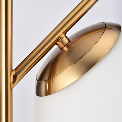 Oda, lampe sophistiquée : tige dorée, base marbre. Touche glamour et moderne.